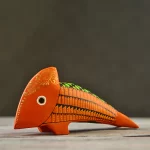 Alebrije de Pez naranja Tallado en madera y decorado con grecas