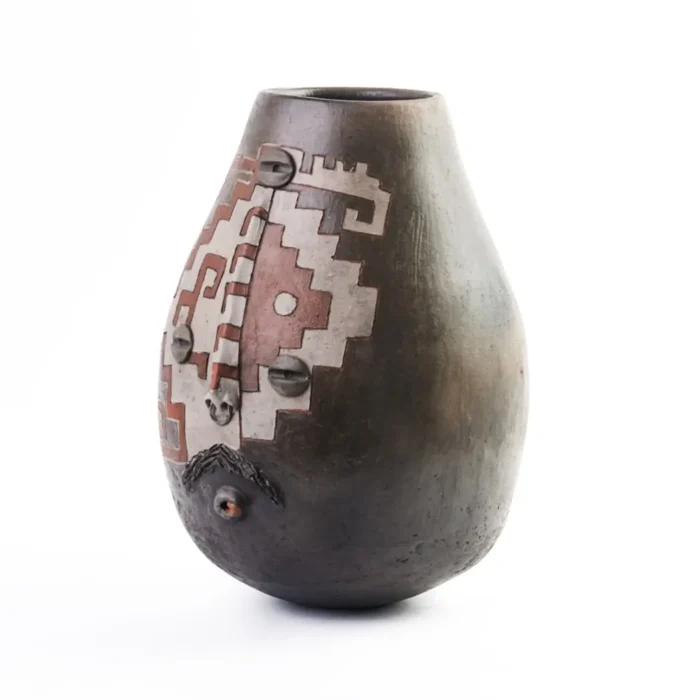 Vase with face design and grecas