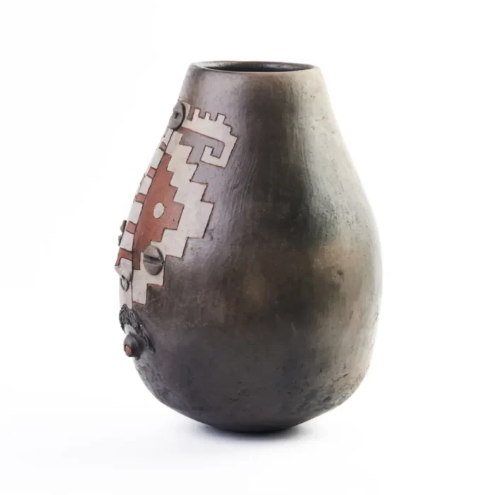 Vase with face design and grecas