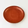 Plato de barro rojo