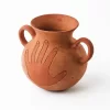 Pot with handle and hand in red clay