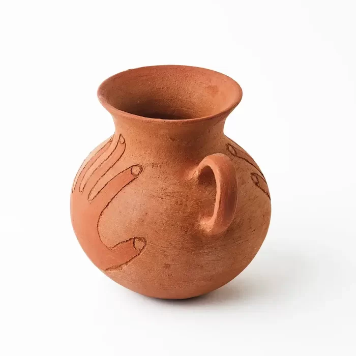 Pot with handle and hand in red clay