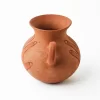 Pot with handle and hand in red clay