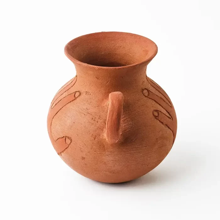 Pot with handle and hand in red clay
