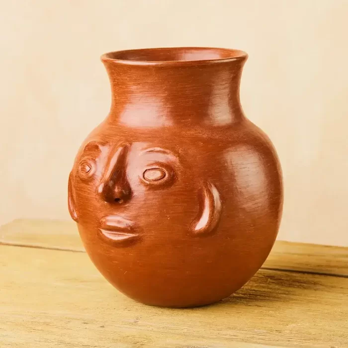 2 lt. face-shaped vessel