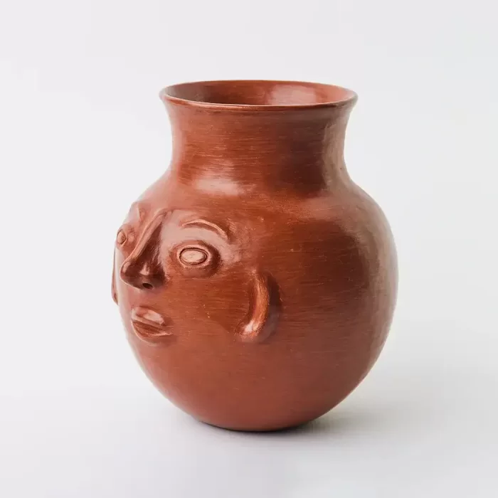 2 lt. face-shaped vessel