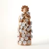 Doll with Alcatraces and White Pastillage Flowers - Handcrafted Art of Floral Elegance