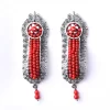 Filigree earrings, with red details