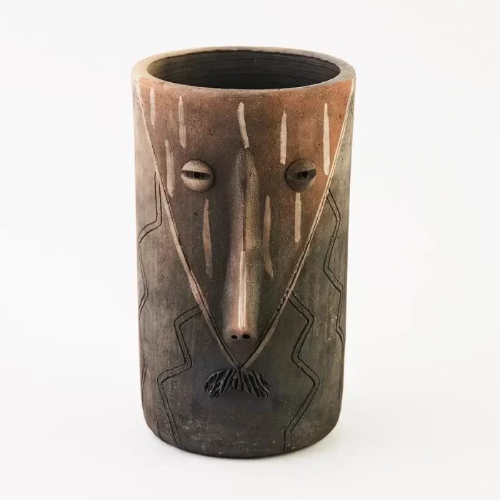 Long glass with face design and colors. Diferent models.