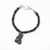 Bracelet with black mud charm. Different models.