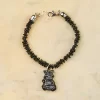 Bracelet with black mud charm. Different models.