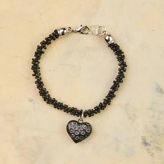 Bracelet with black mud charm. Different models.