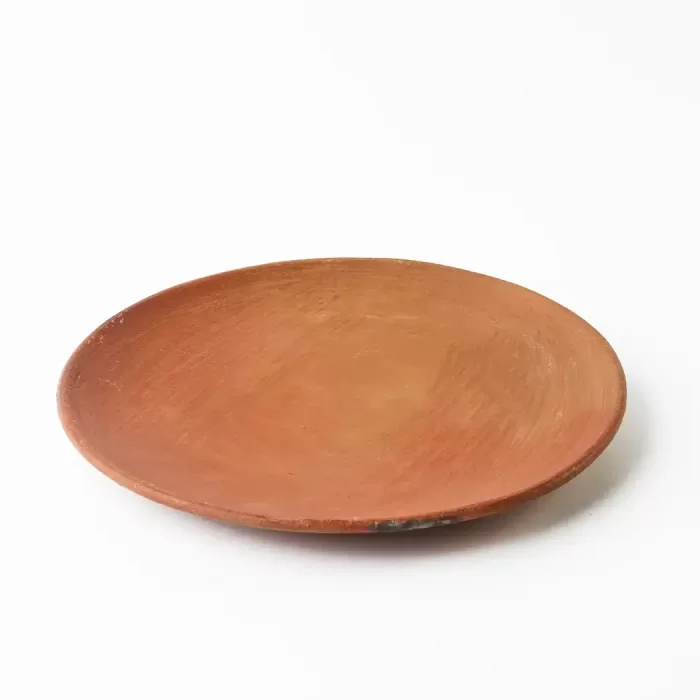 Large red clay comal