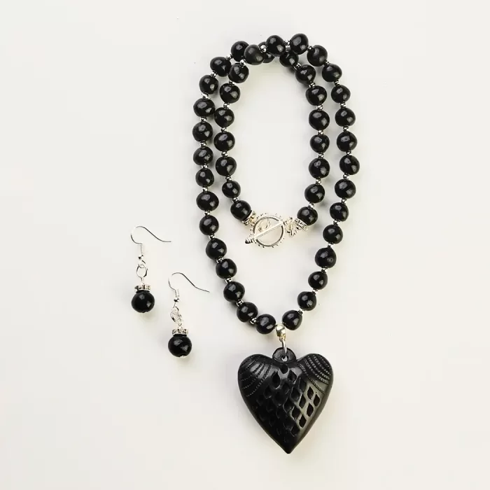 Black clay necklace with heart charm