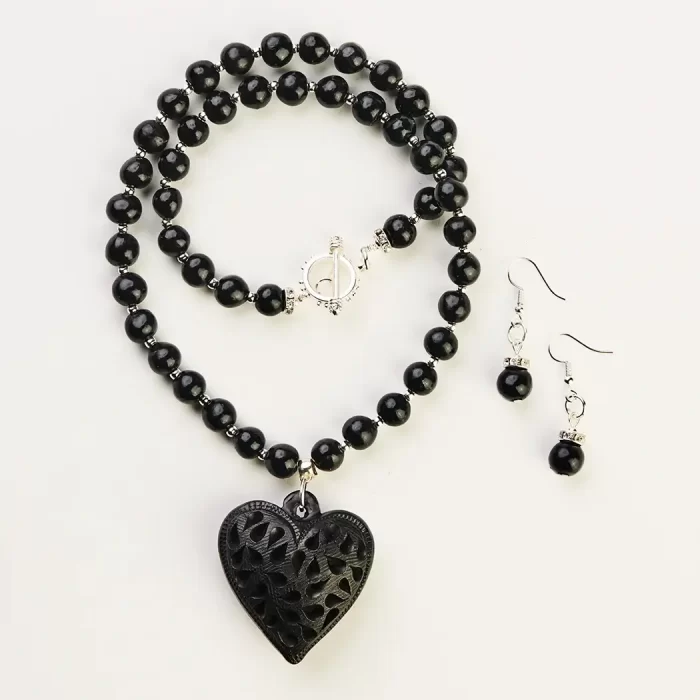 Black clay necklace with heart charm