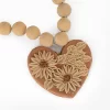 Clay necklace with decorated pendant