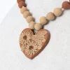 Clay necklace with decorated pendant