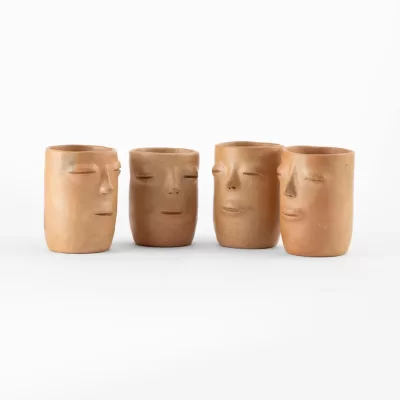 Tumbler with natural clay face