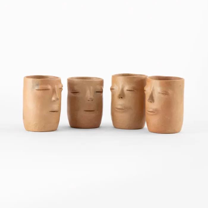 Tumbler with natural clay face