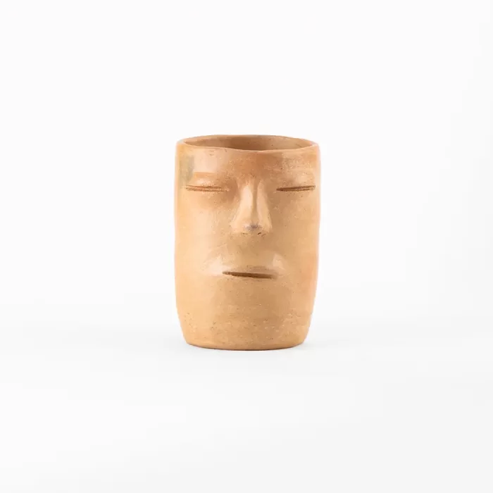 Tumbler with natural clay face