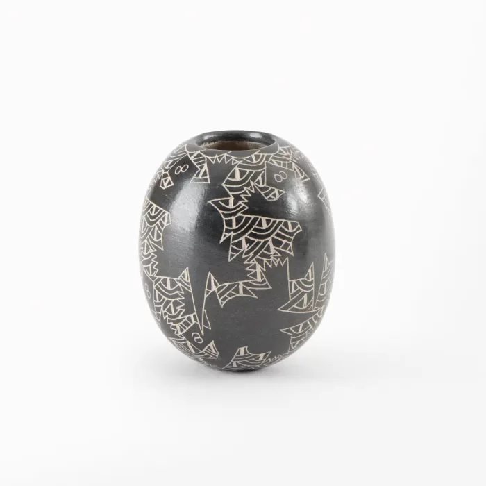 Black and white ceramic pot with elongated design