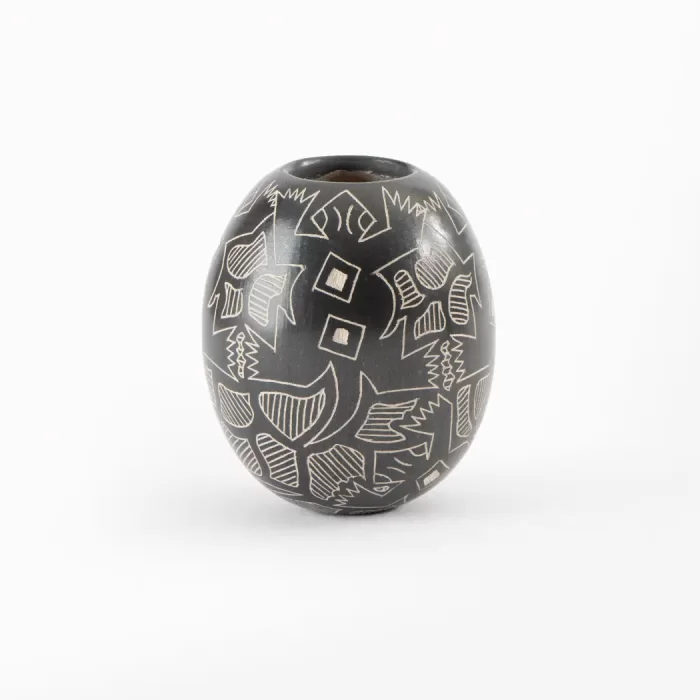 Black and white ceramic pot with elongated design