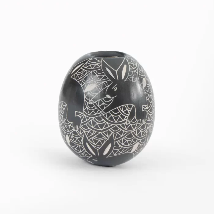 Black and white ceramic pot with elongated design