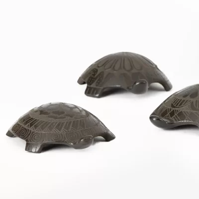 Ceramic turtle in brown color. Diferent models.