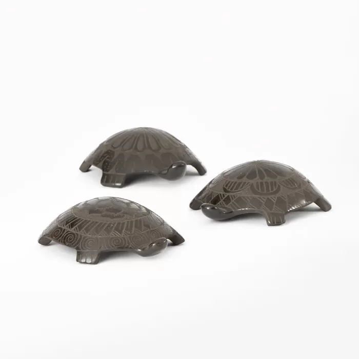 Ceramic turtle in brown color. Diferent models.