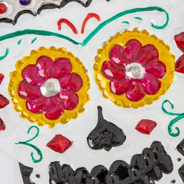 Calavera de hojalata con sombrero