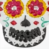 Calavera de hojalata con sombrero