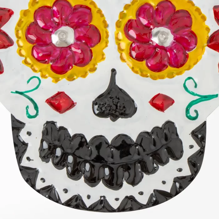 Calavera de hojalata con sombrero
