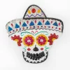 Calavera de hojalata con sombrero