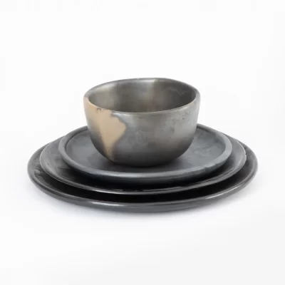 Service of 4 pieces in black clay