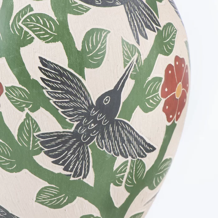 Mata Ortiz elongated ceramic pot with flower and hummingbird design