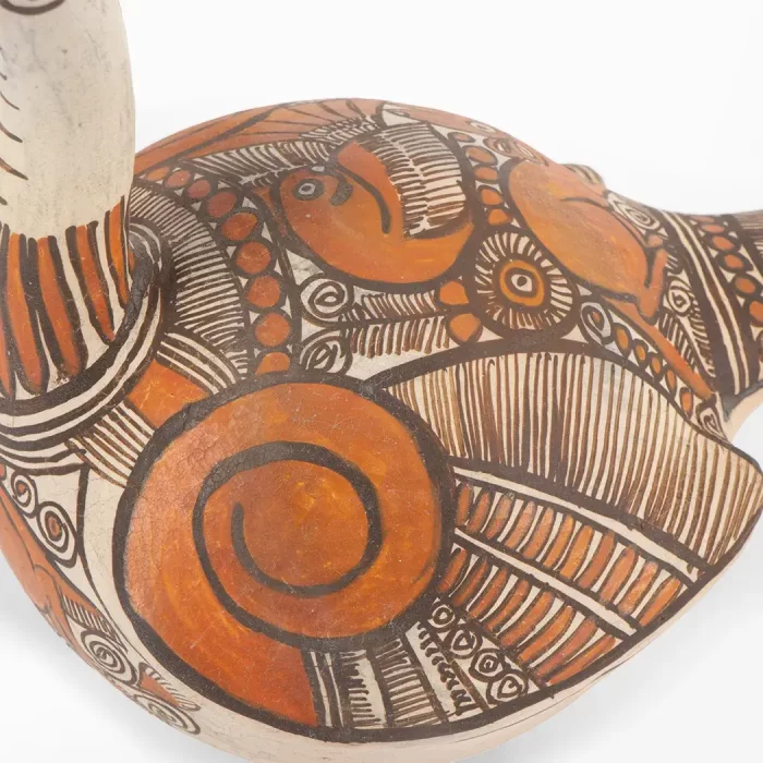 Small painted clay dove