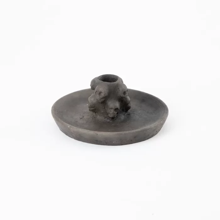 Small candlestick with skulls