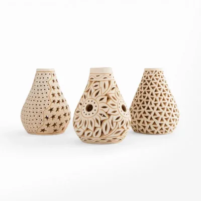 Openwork white clay bottle