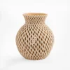 Beige openwork earthenware vase