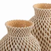 Beige openwork earthenware vase