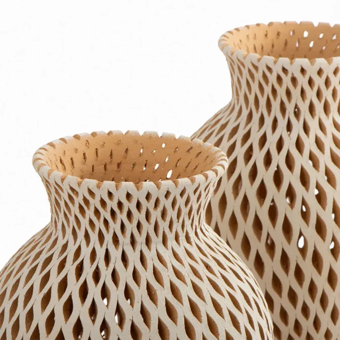 Beige openwork earthenware vase