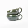 Taza de barro verde