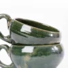Taza de barro verde