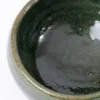 Taza de barro verde