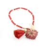 Pulsera de piedras de colores con dije de madera