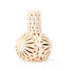 Little bottle with long neck and openwork clay
