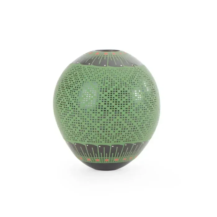 Black clay pot, green paint