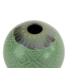 Black clay pot, green paint