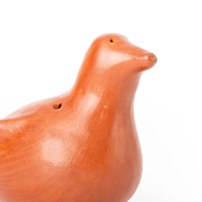 Palomita de barro rojo